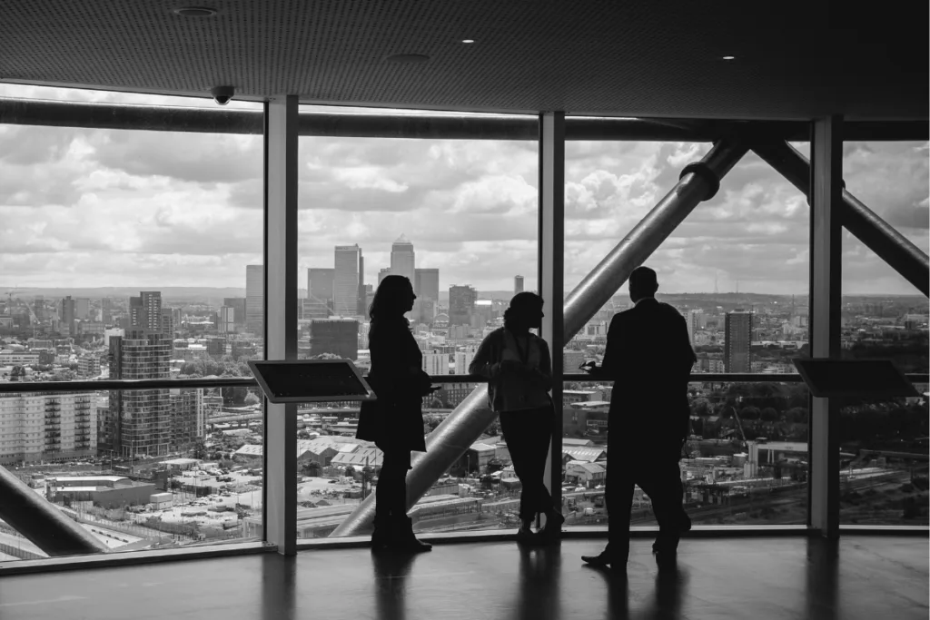 Executives overlooking a city skyline